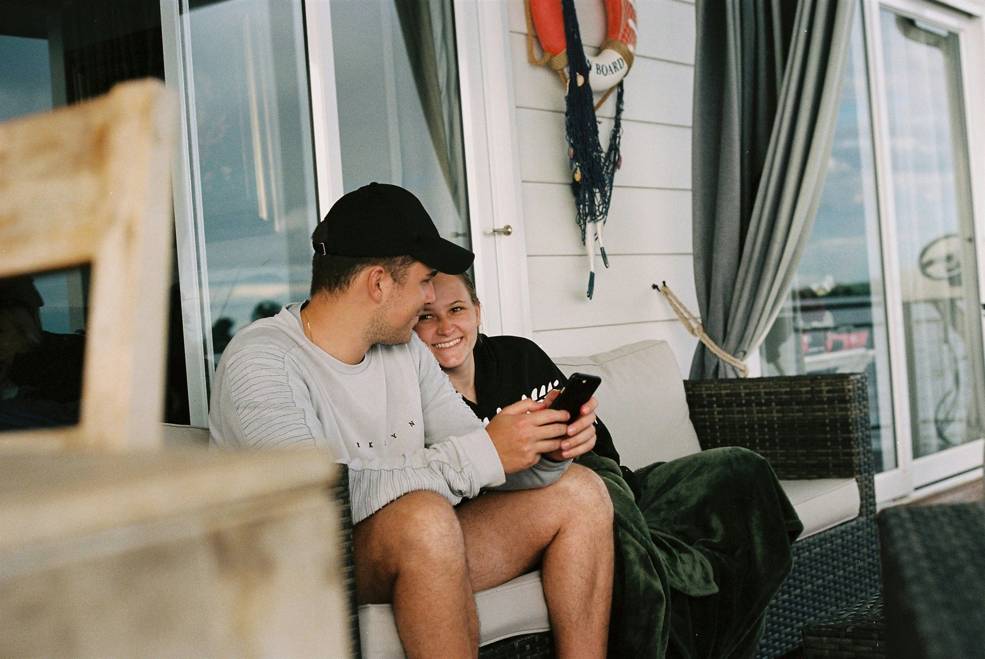 Patient couple reviewing their healthcare bill together, smiling