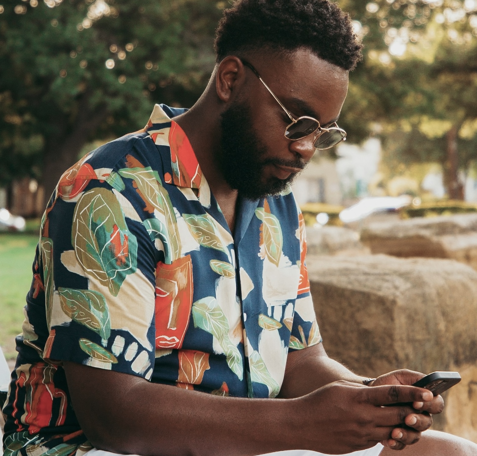 A patient reviewing his healthcare bill on his phone