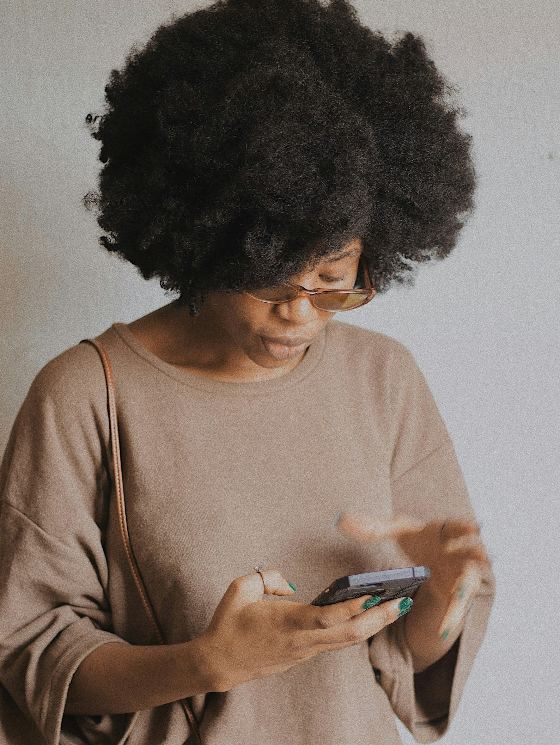 A patient getting a billing question answered instantly on her phone